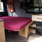 Bed in "Dudley" DIY Sprinter conversion