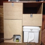 Kitchen drawers and porta-potty in Dan's DIY Sprinter conversion